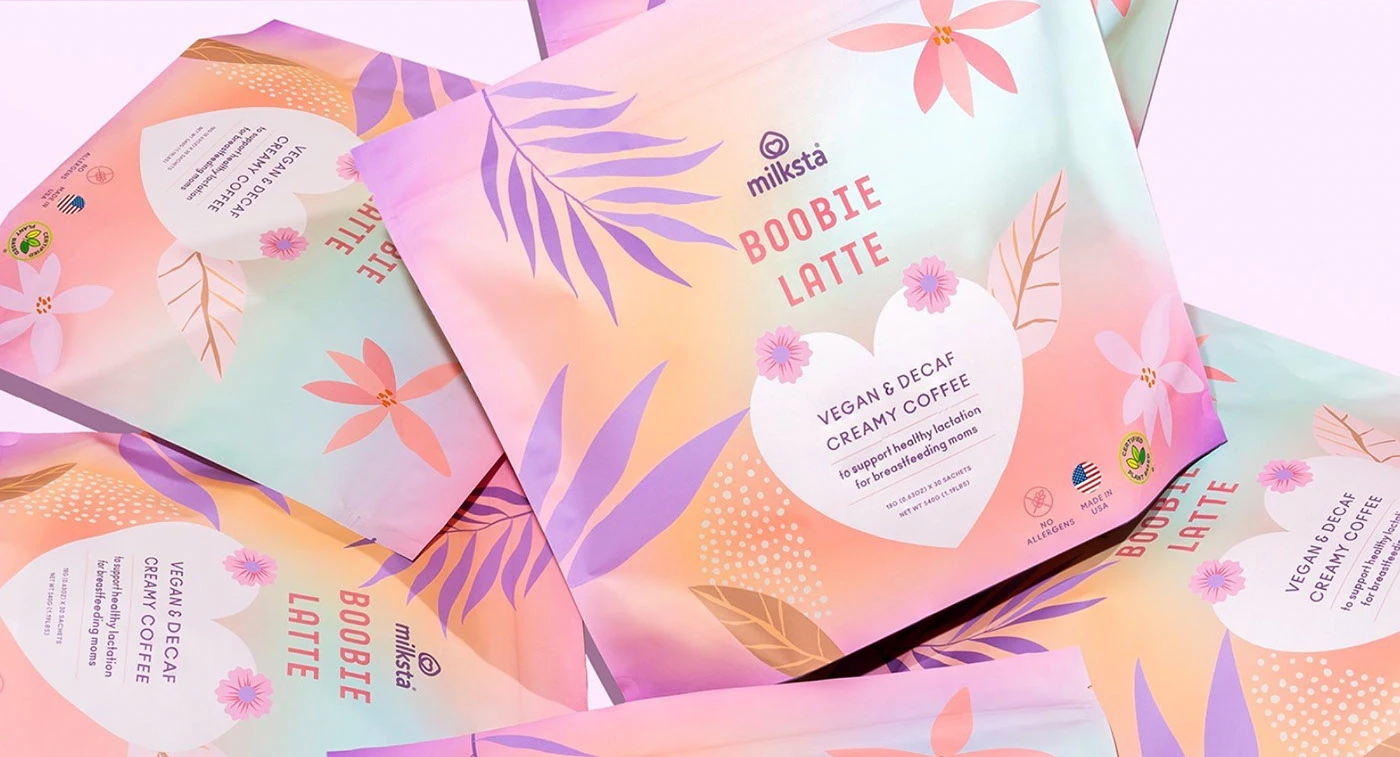 Four Milksta pouches overlapping with purple and coral paper leaves between them