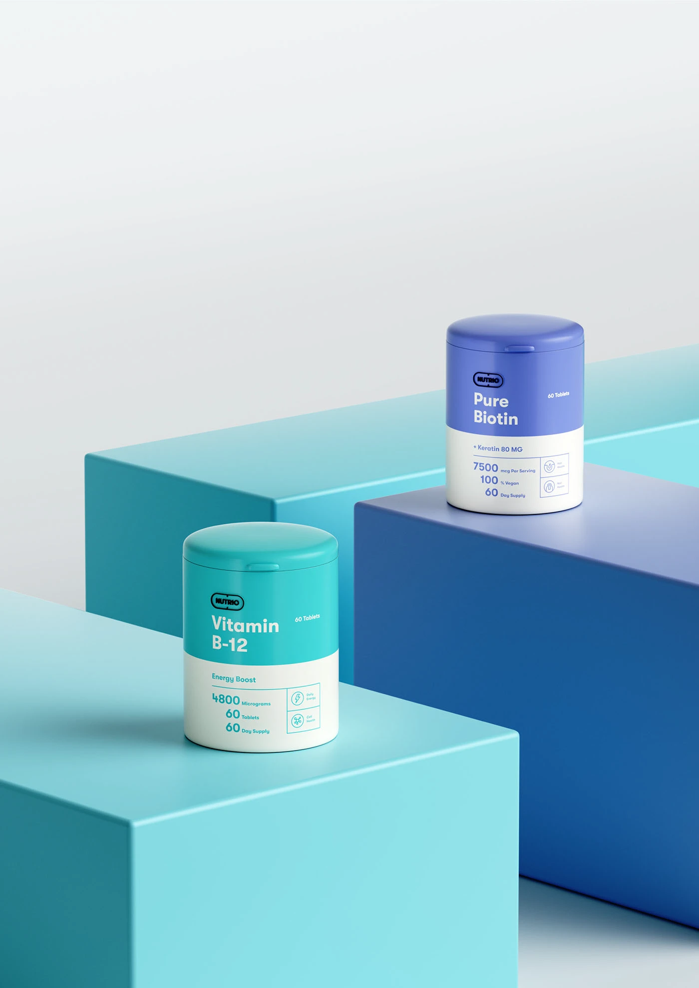 Two Nutrio tubs standing on blue and teal blocks in soft light