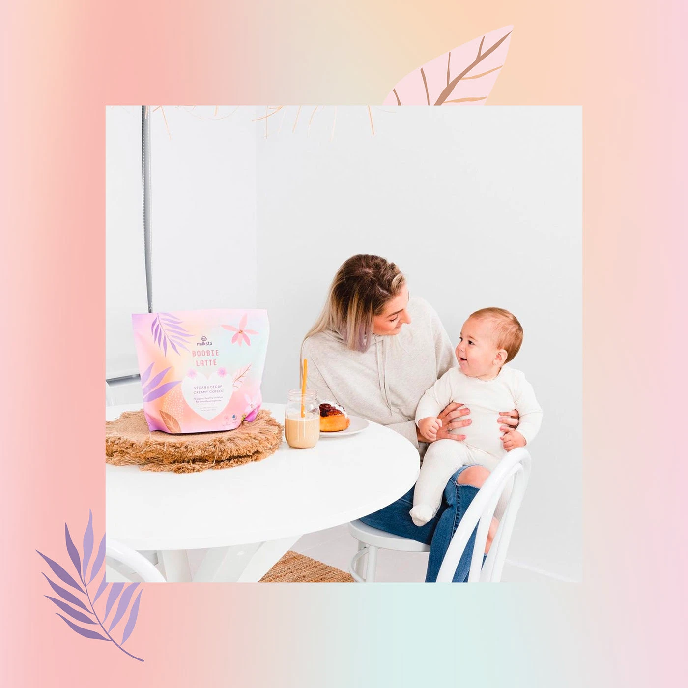Mother and baby at a table with the Milksta pouch on a gradient panel